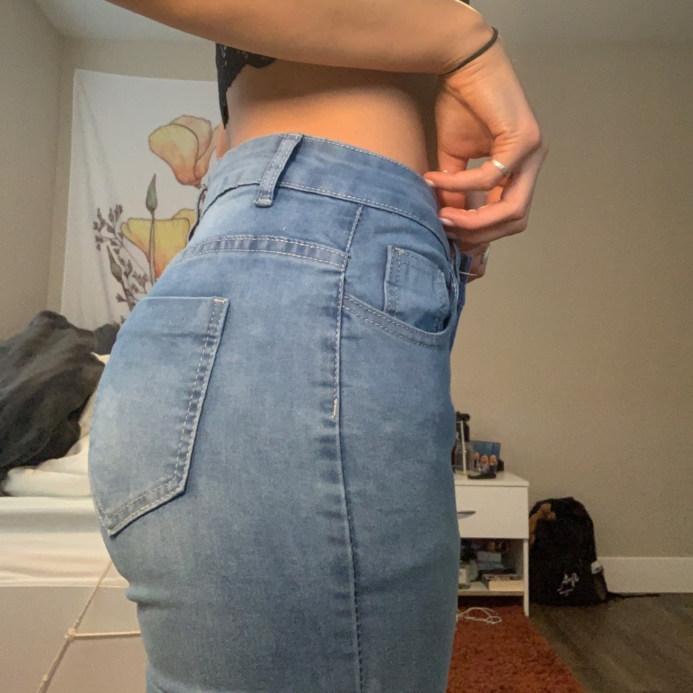 Blue slit flare high waisted jeans